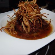 Beef Tenderloin Special set in Yuzu Truffle Butter and finished with Crispy Onion Straws at NOBU