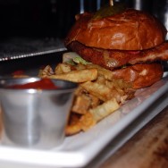 Crispy Fried Pork Chop Sandwich at The Basement Tavern