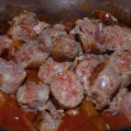 Hot Italian Sausage (sliced) simmering in Ragú® Old World Style® Traditional Sauce