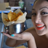 Employee Sarah presenting Dirty Chips at Dirt Dog LA