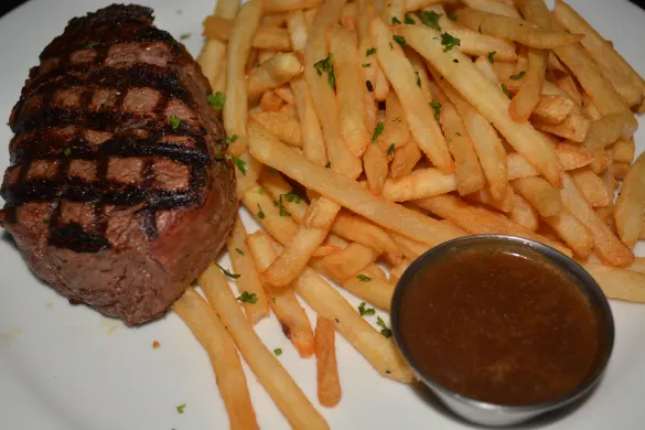Grilled Filet Mignon w/ Peppercorn sauce & Hand-cut Fries at Killer Shrimp Grilled Filet Mignon w/ Peppercorn sauce & Hand-cut Fries at Killer Shrimp
